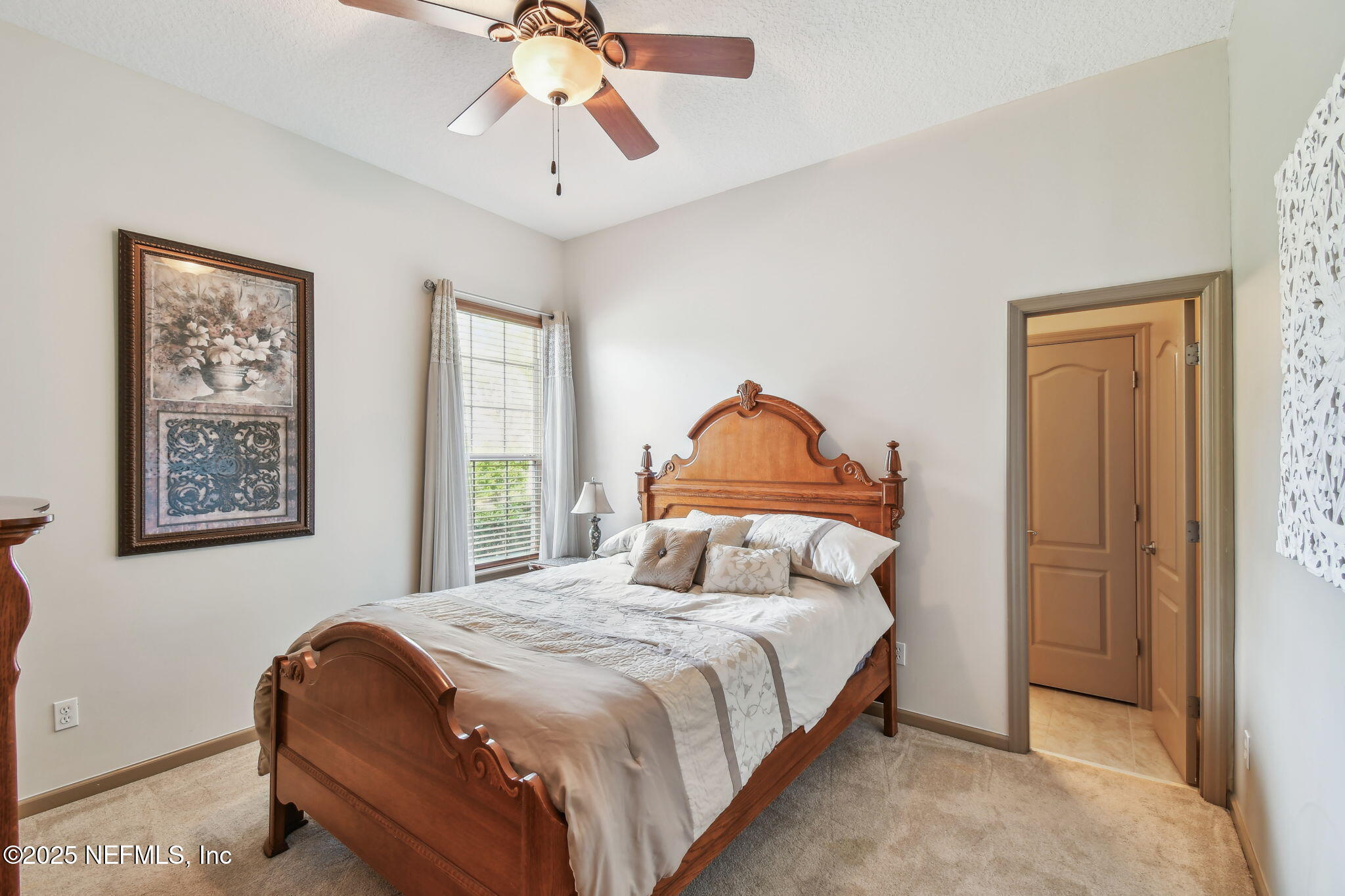 100 La Mesa Drive St. Augustine, FL 32095 - Photo 32 of 49 a bedroom with a bed and a window