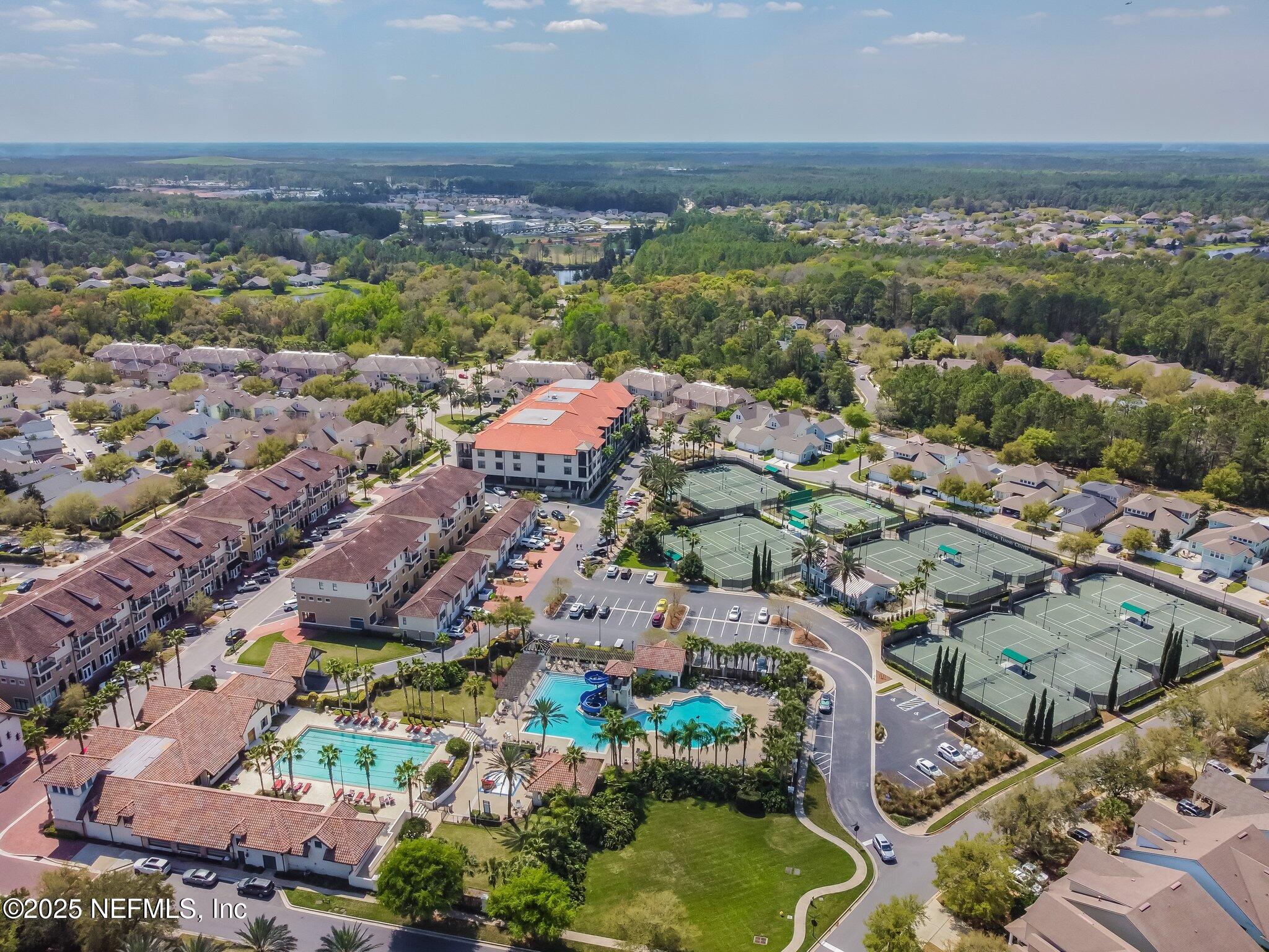 100 La Mesa Drive St. Augustine, FL 32095 - Photo 48 of 49 an aerial view of a city with lots of residential buildings