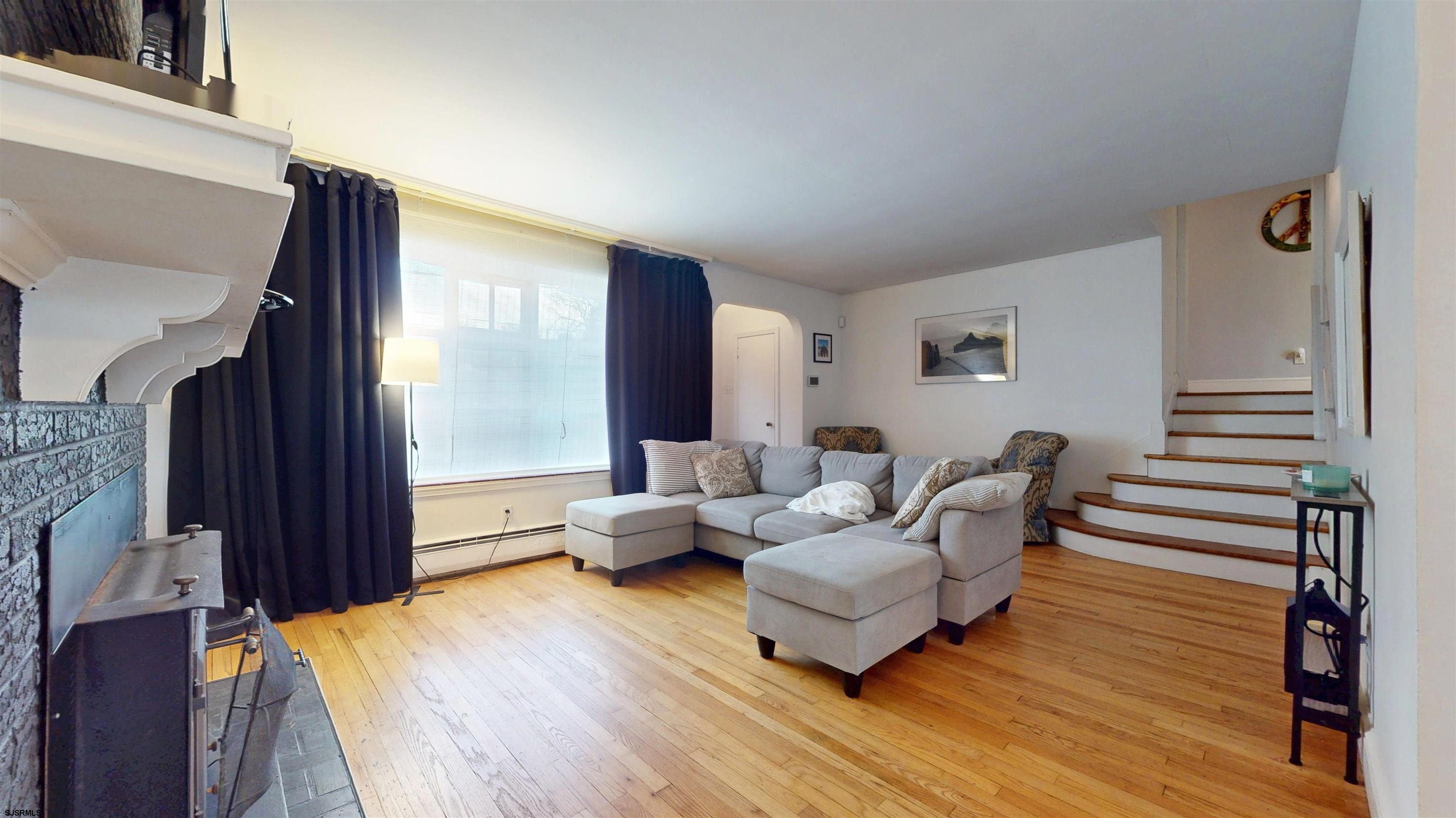 2300 Shore Road Linwood, NJ 08221 - Photo 14 of 50 a living room with furniture and wooden floor