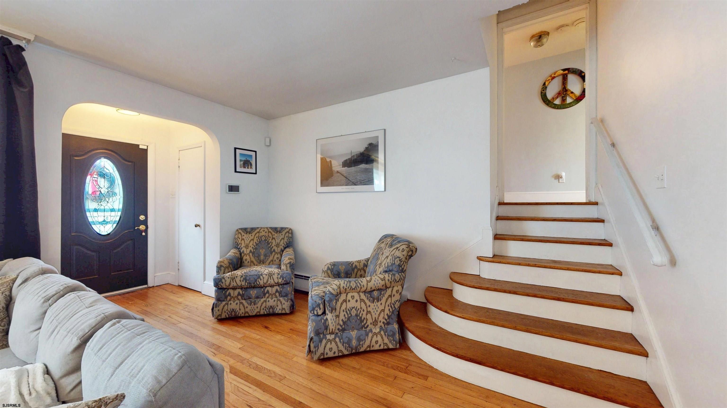 2300 Shore Road Linwood, NJ 08221 - Photo 15 of 50 a bedroom with furniture and a chandelier