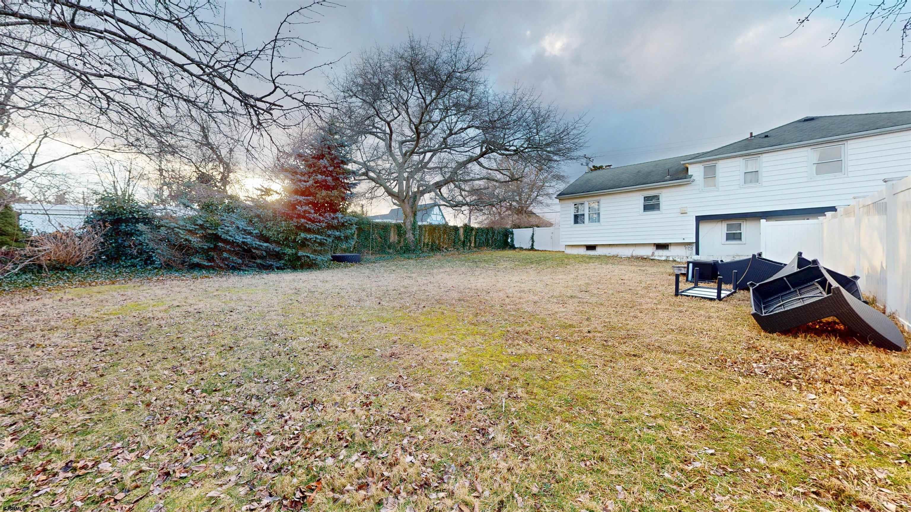 2300 Shore Road Linwood, NJ 08221 - Photo 20 of 50 a big yard with lots of green space and trees