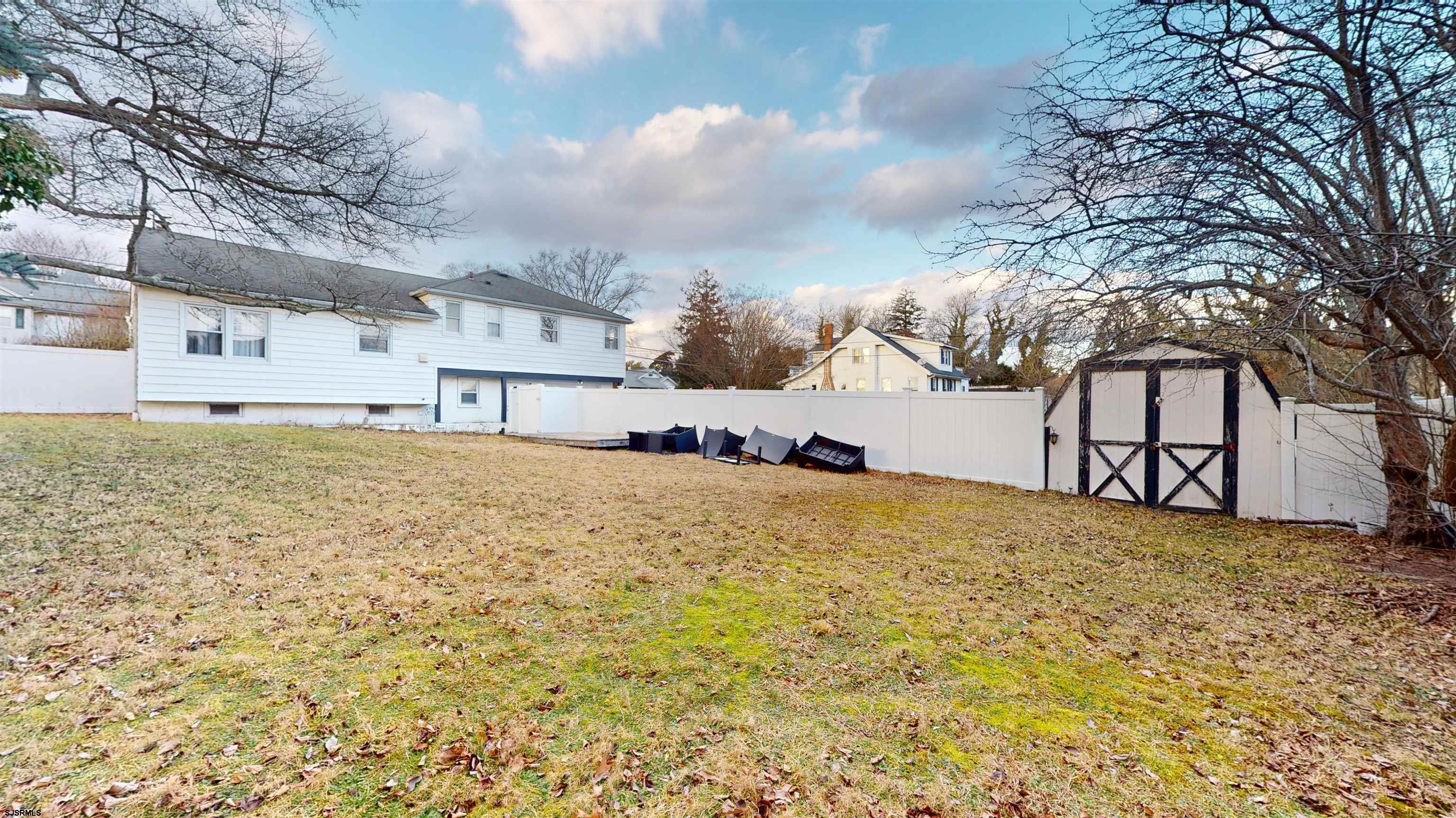 2300 Shore Road Linwood, NJ 08221 - Photo 21 of 50 a view of a house with a snow in the yard