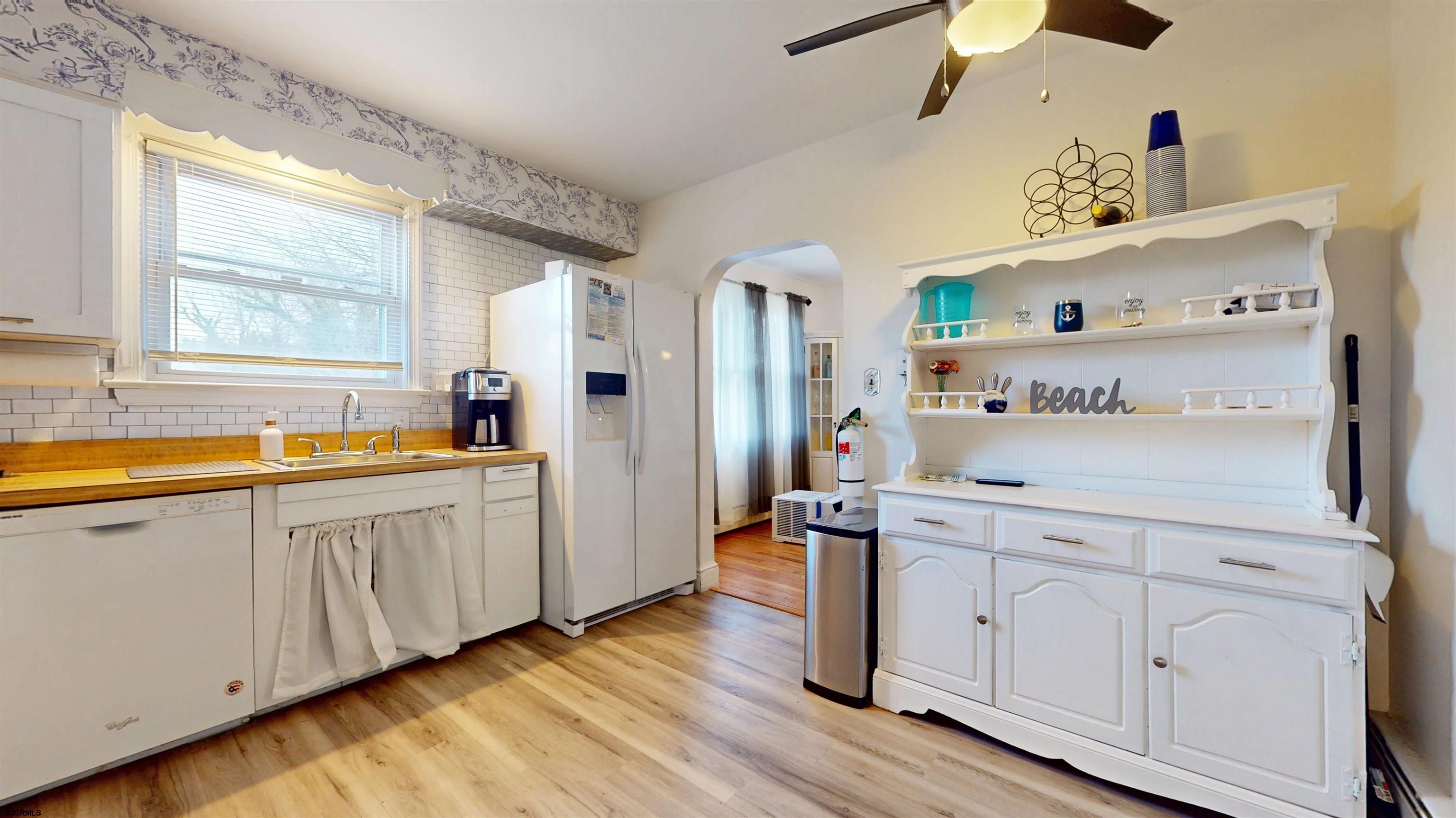 2300 Shore Road Linwood, NJ 08221 - Photo 30 of 50 a view of cabinets a wooden floor and window in a room