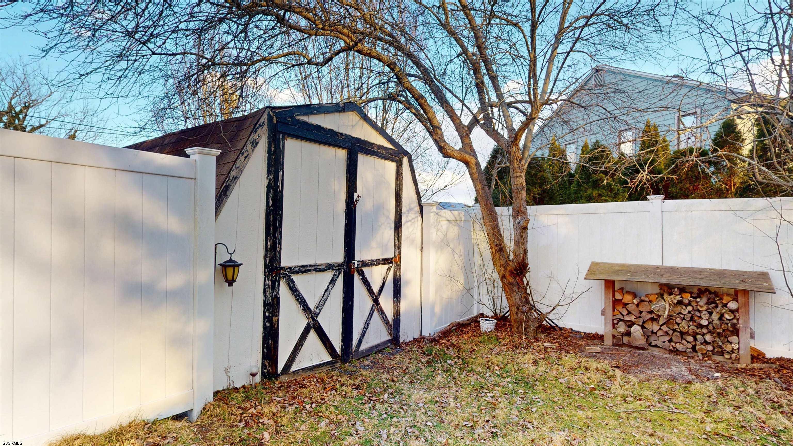 2300 Shore Road Linwood, NJ 08221 - Photo 46 of 50 a backyard of a house with lots of green space