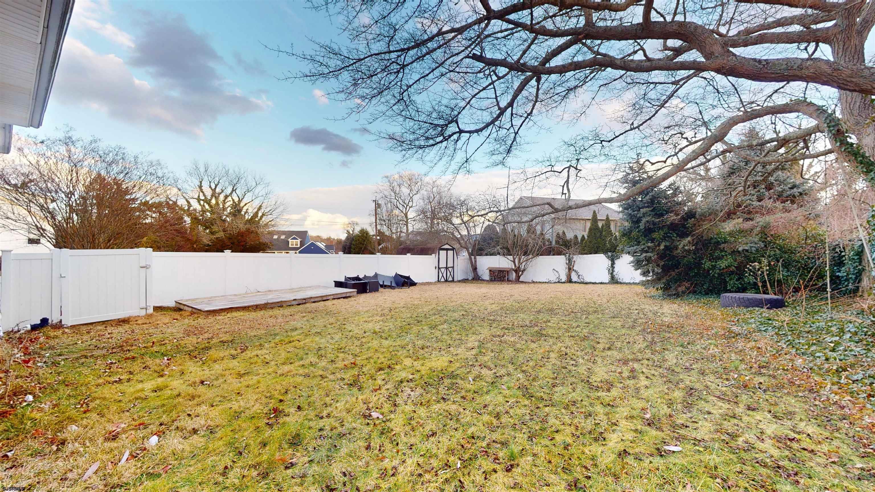 2300 Shore Road Linwood, NJ 08221 - Photo 47 of 50 a backyard of a house with lots of green space