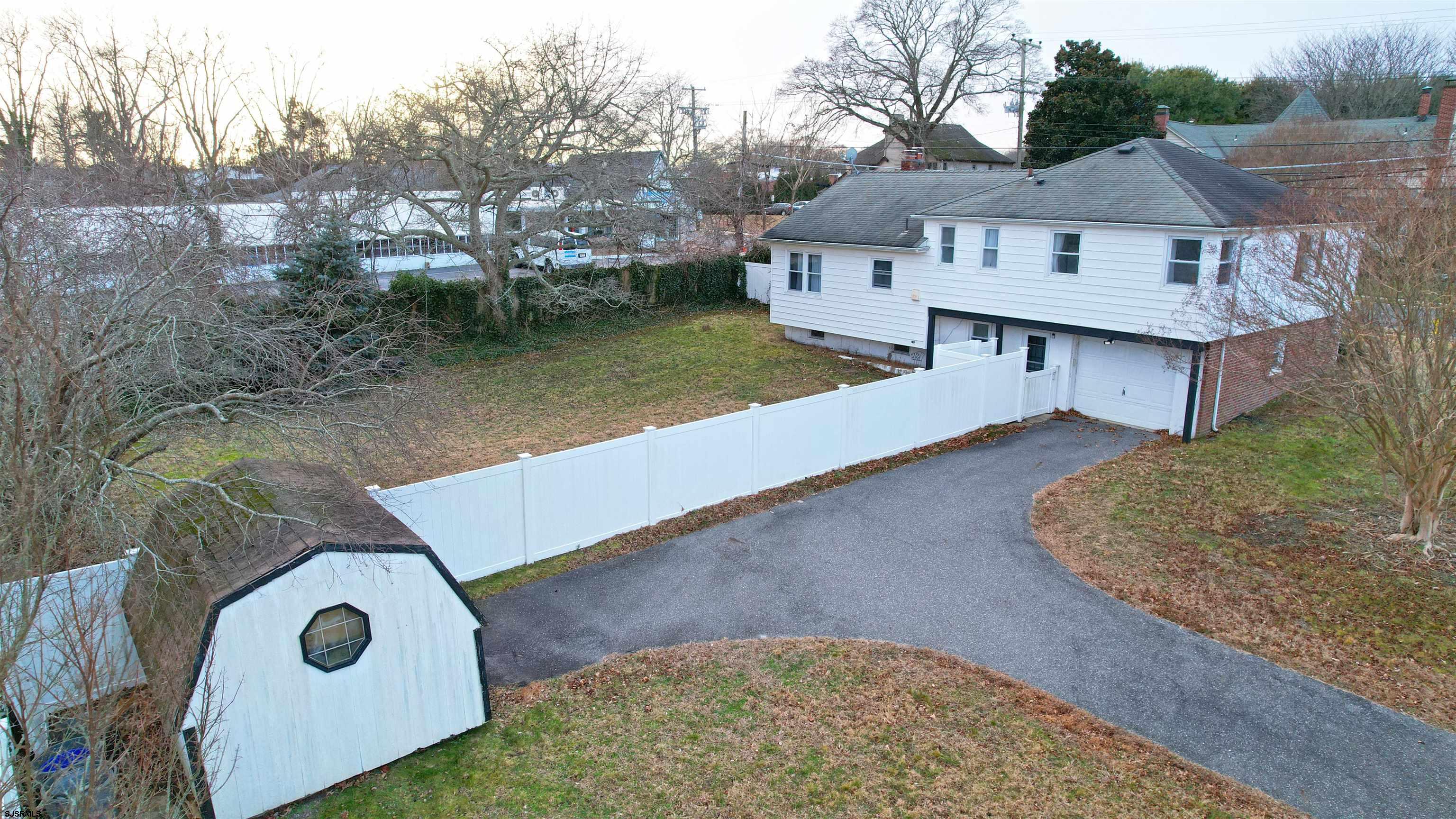 2300 Shore Road Linwood, NJ 08221 - Photo 9 of 50 an aerial view of a house with yard