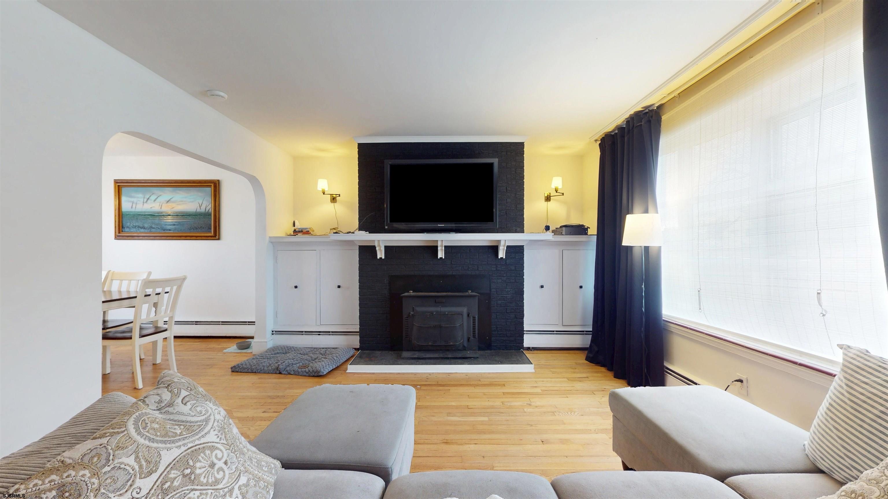 2300 Shore Road Linwood, NJ 08221 - Photo 10 of 50 a living room with furniture and a flat screen tv