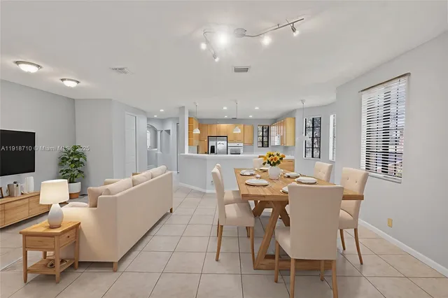 a view of a dining room with furniture