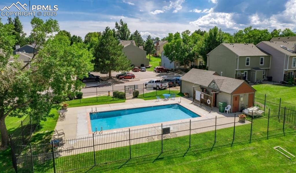3515 Queen Anne Way Colorado Springs, CO 80917 - Photo 33 of 33 a aerial view of a house with porch and a garden