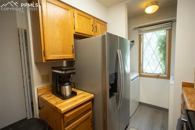 a bathroom with a sink toilet and mirror