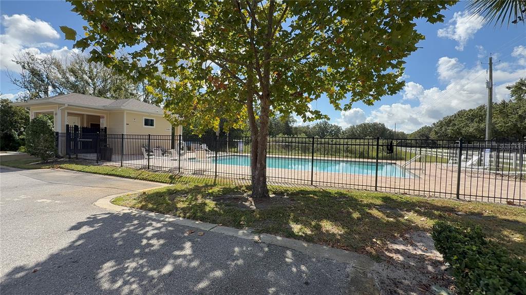 611 Autumn Stream Drive Auburndale, FL 33823 - Photo 29 of 30 a view of a house with a backyard