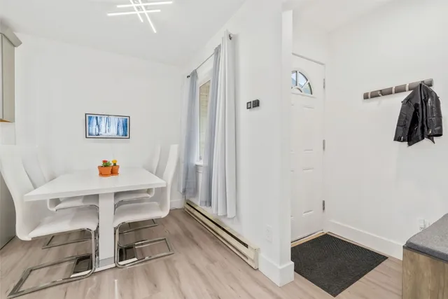 a workspace with furniture and wooden floor