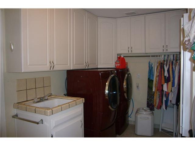 2146 Gum Tree Lane Fallbrook, CA 92028 - Photo 17 of 23 Separate Laundry Room with 1/2 bath and back door for access from pool/spa and yard.
