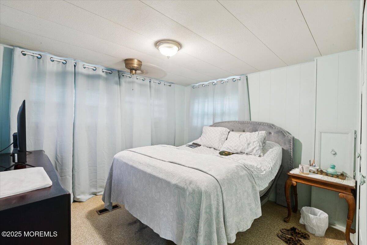 318 Roberts Road Toms River, NJ 08755 - Photo 10 of 14 a bedroom with a bed and a desk