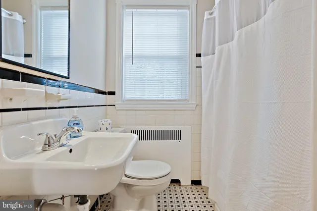 a bathroom with a sink and a toilet
