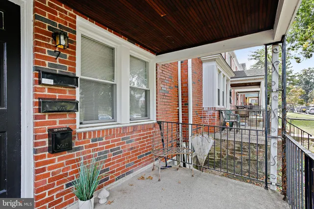 a front view of a house with a glass door