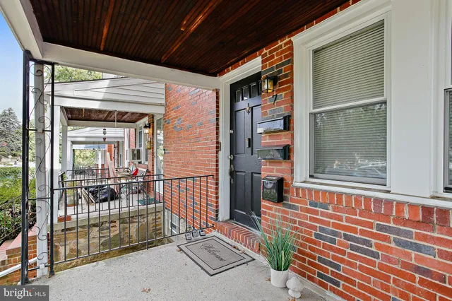 a view of a porch with furniture