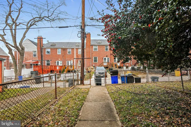a front view of a building with many windows