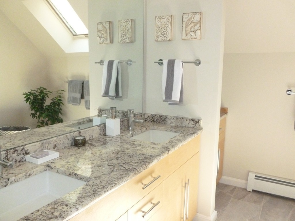 92 Green Road Bolton, MA 01740 - Photo 12 of 17 a bathroom with a granite countertop sink a mirror and shower