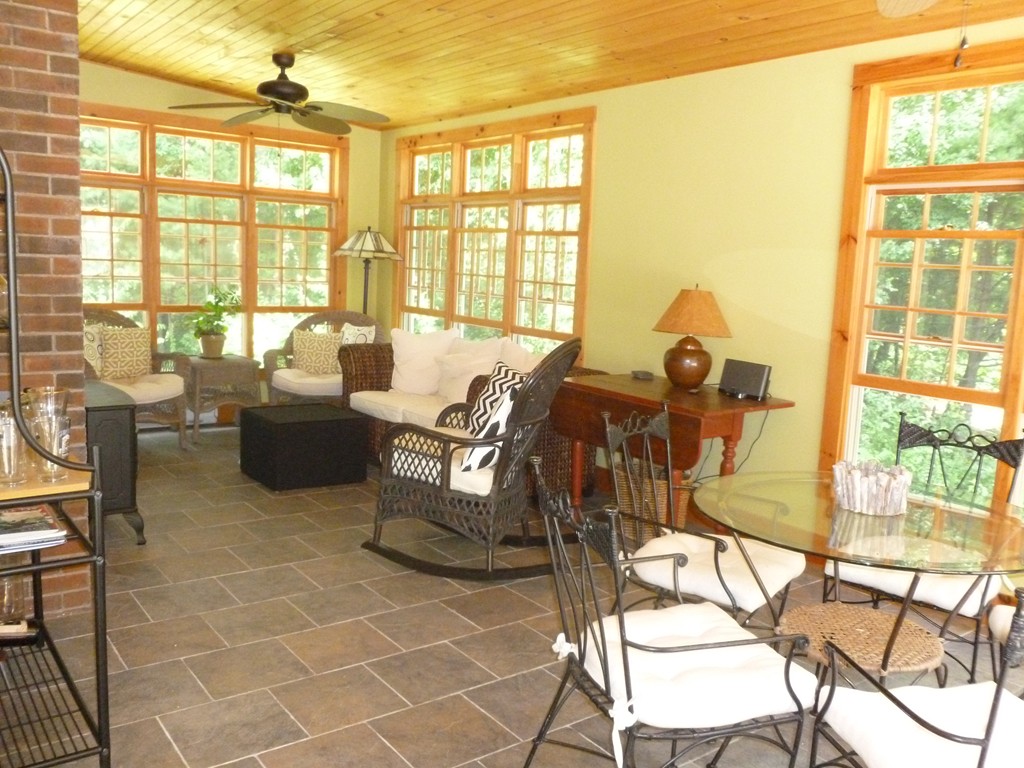 92 Green Road Bolton, MA 01740 - Photo 4 of 17 a living room with furniture and floor to ceiling windows