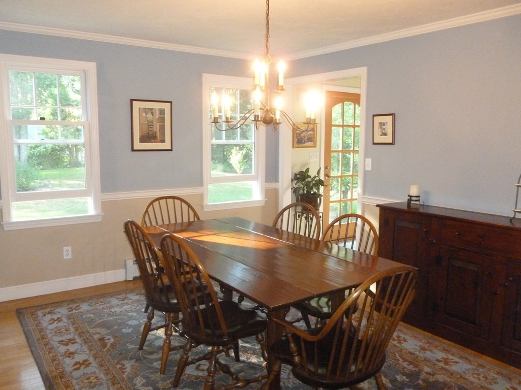 92 Green Road Bolton, MA 01740 - Photo 6 of 17 a view of a dining room with furniture window and outside view