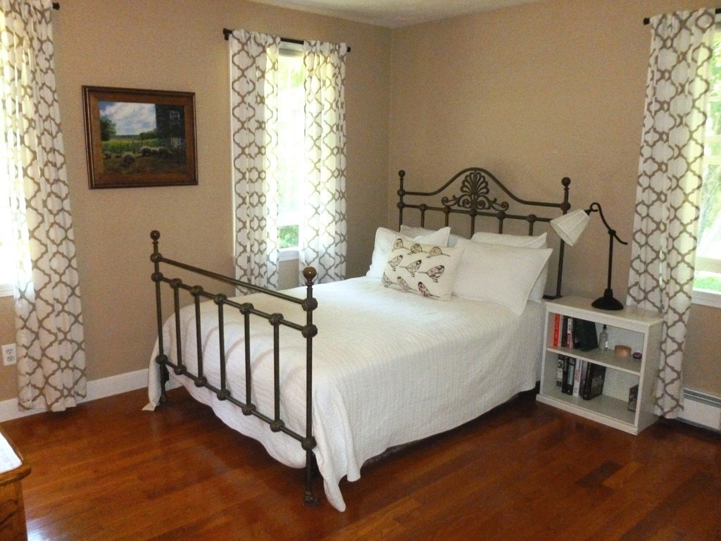 92 Green Road Bolton, MA 01740 - Photo 9 of 17 a bedroom with a bed and a window