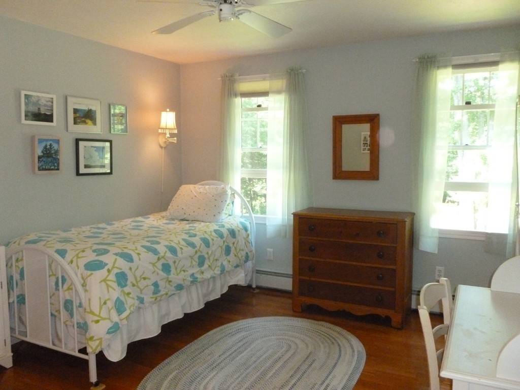 92 Green Road Bolton, MA 01740 - Photo 10 of 17 a bedroom with a bed and a window