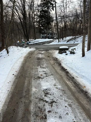 a view of a backyard of a house