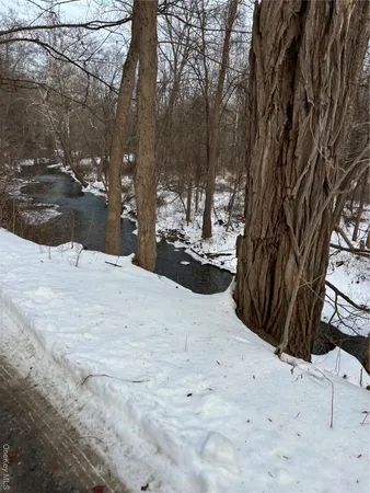 a view of a backyard of the house