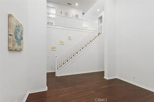 a view of entryway with wooden floor