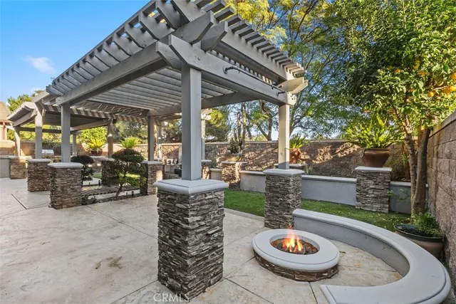 a view of a porch with chairs and a patio