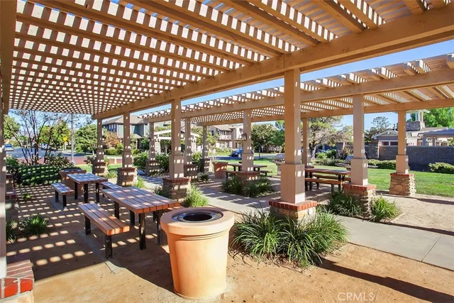 a view of a park with swings and slides