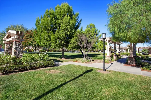 a view of a chairs and table on the wooden floor