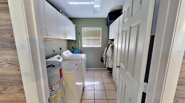 a bathroom with a sink toilet and a mirror