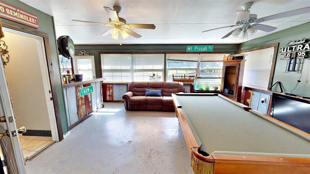 635 Bost Road Wauchula, FL 33873 - Photo 31 of 39 a living room with furniture and a large window