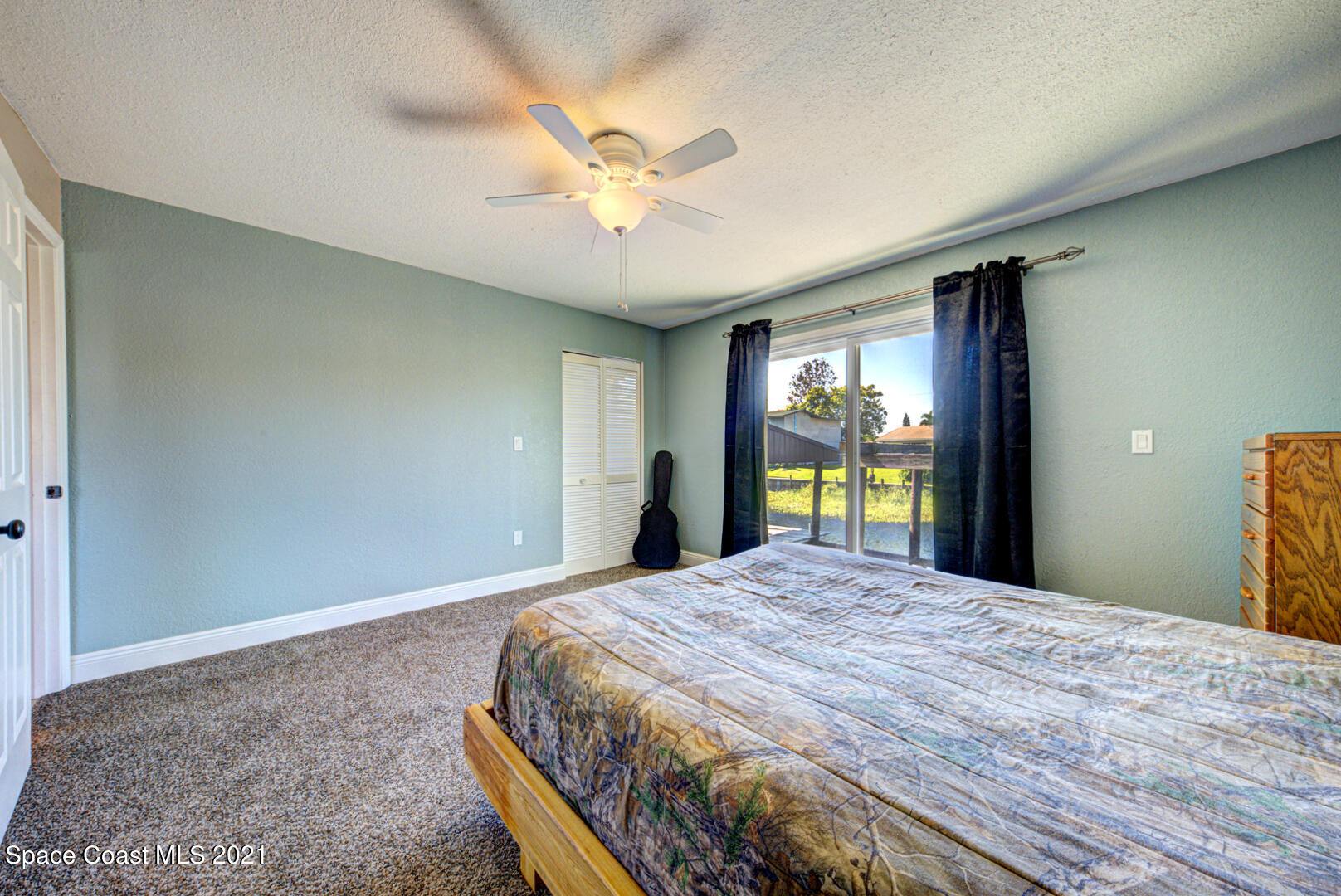 826 Mallard Road Cocoa, FL 32926 - Photo 14 of 21 bedroom 2 with slider to backyard