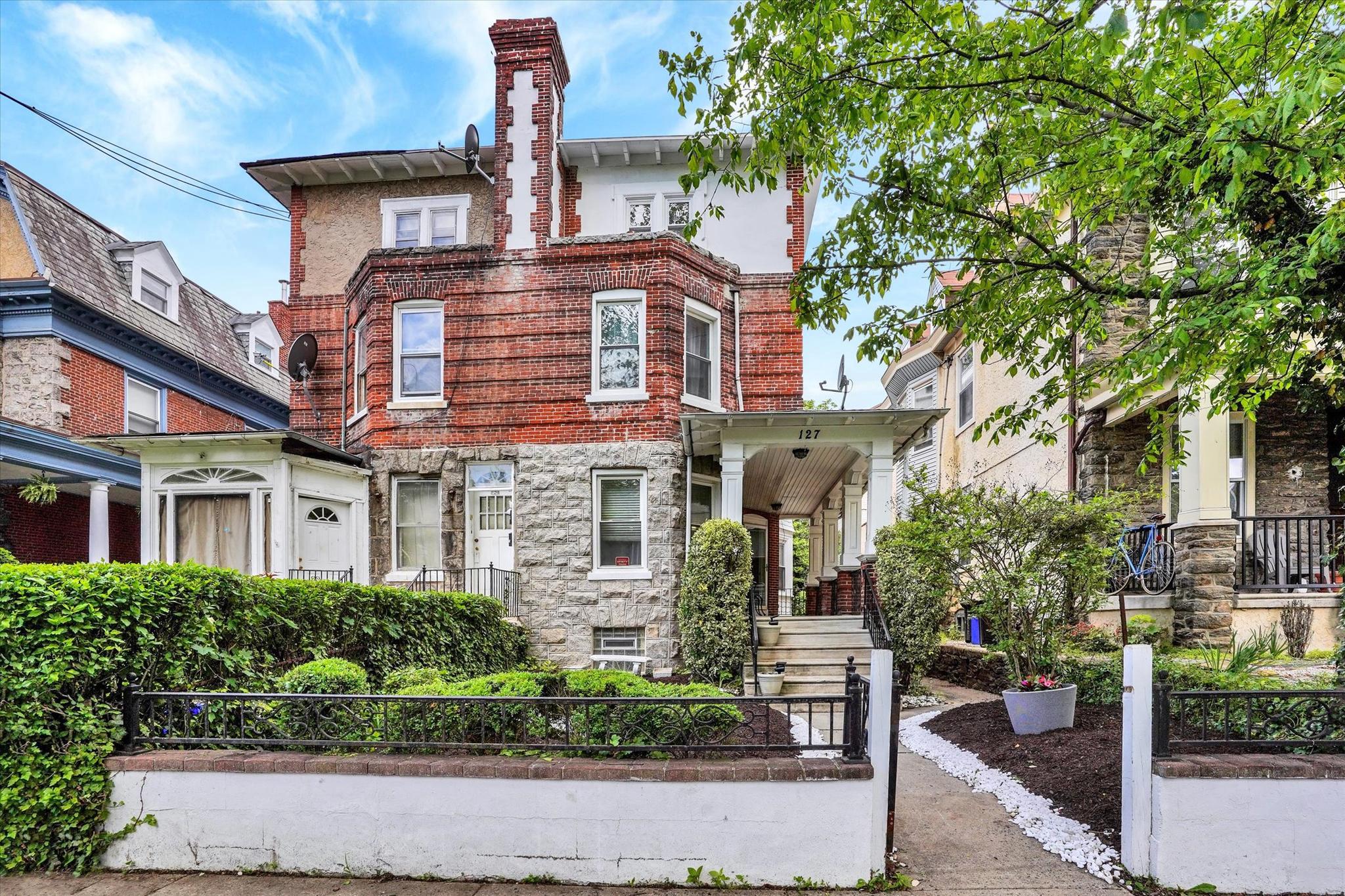 Gorgeous landscaped front yard & Huge Porch