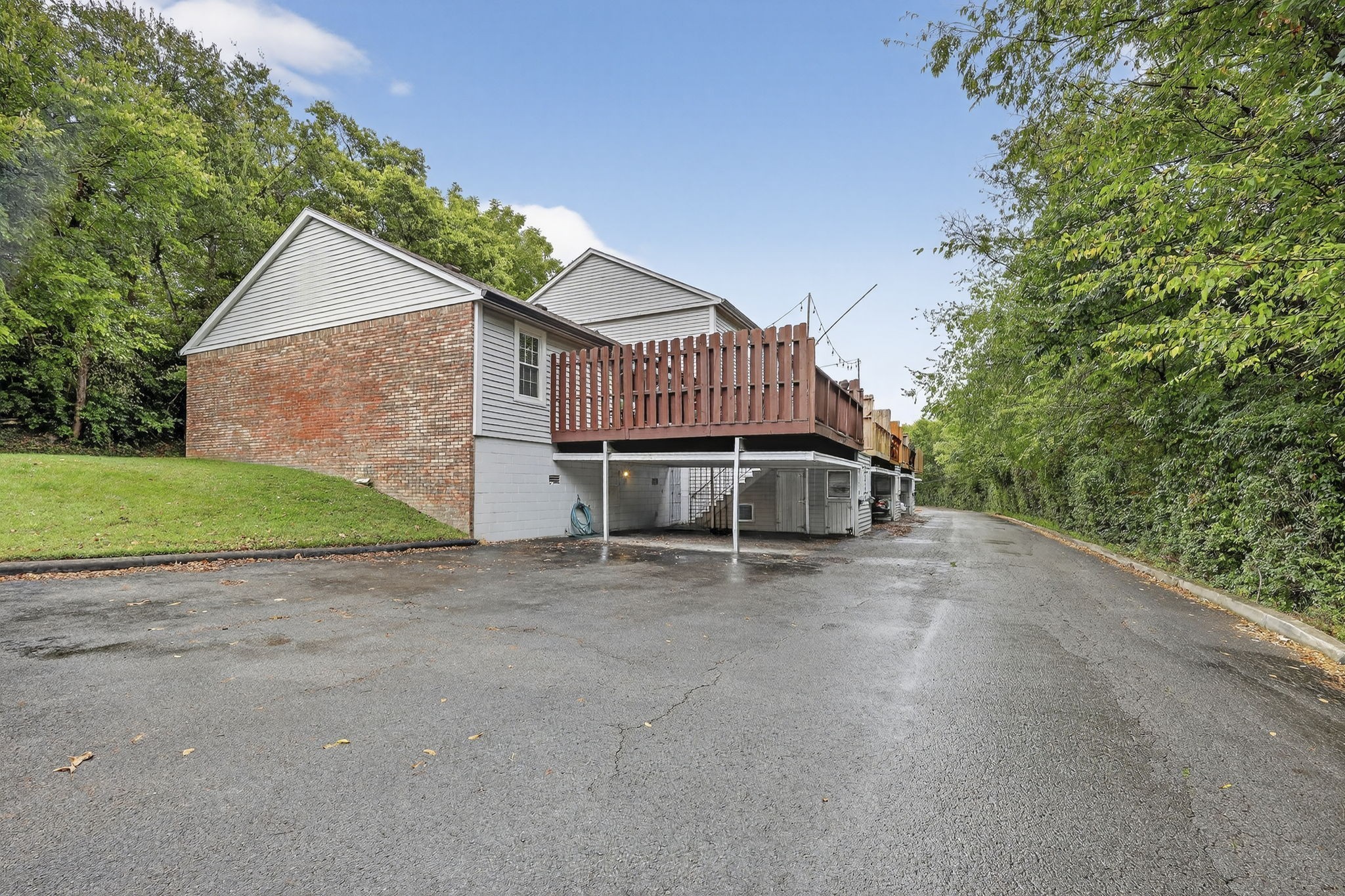 367 Huntington Ridge Drive Nashville, TN 37211 - Photo 24 of 28 a view of a house with a yard and large trees