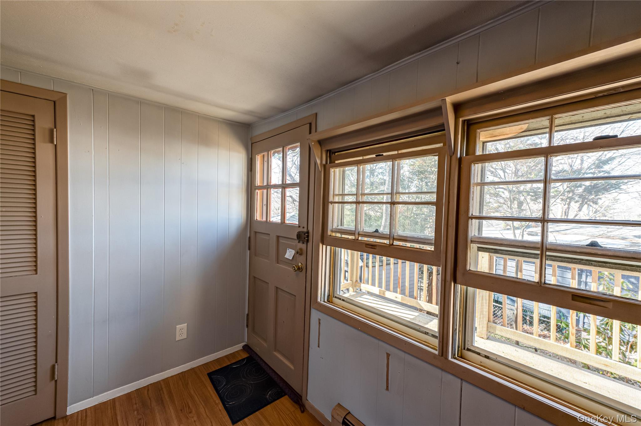 75 Herod Point Road Wading River, NY 11792 - Photo 20 of 29 Kitchen door to deck