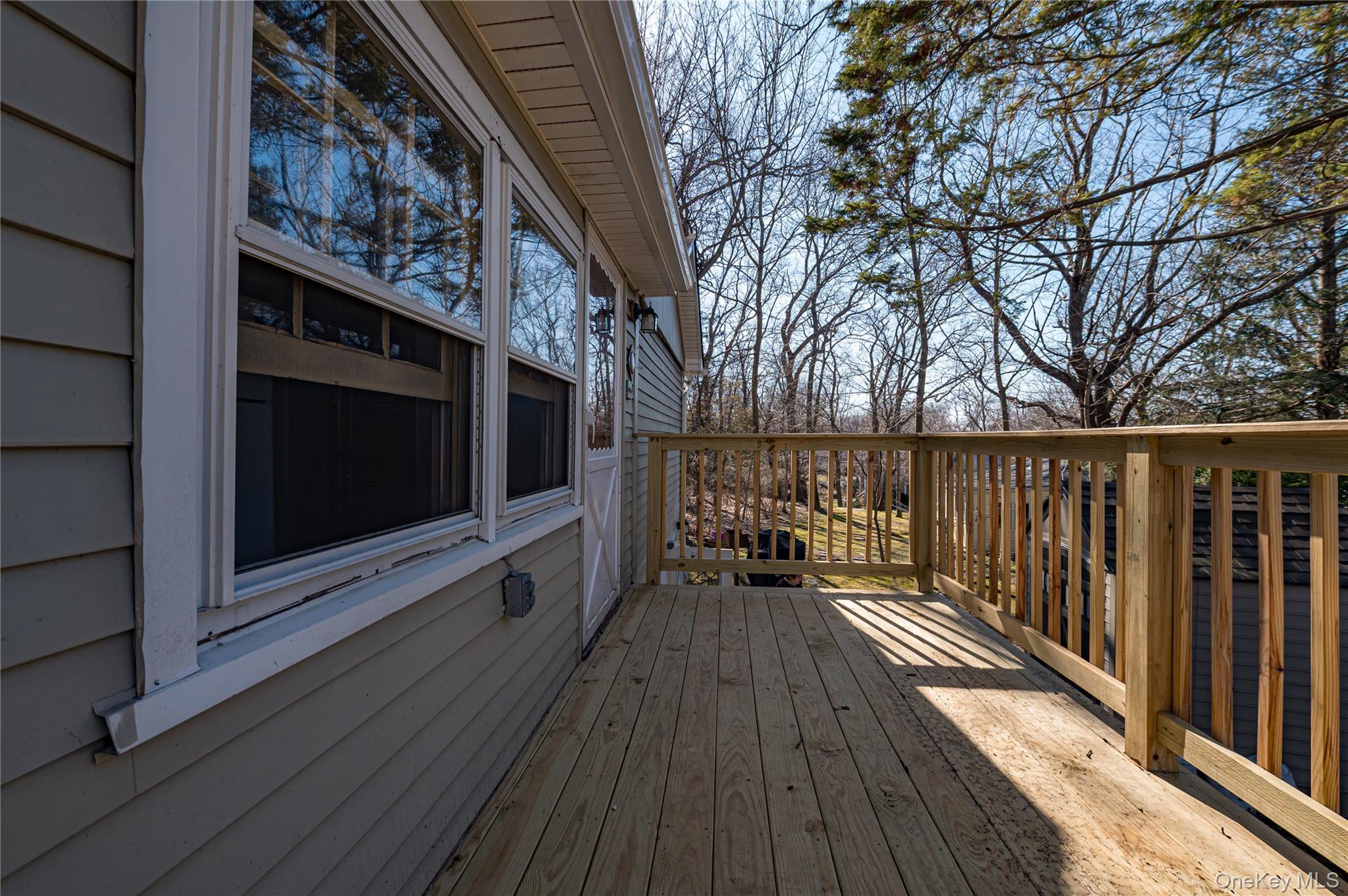 75 Herod Point Road Wading River, NY 11792 - Photo 5 of 29 Deck off Kitchen
