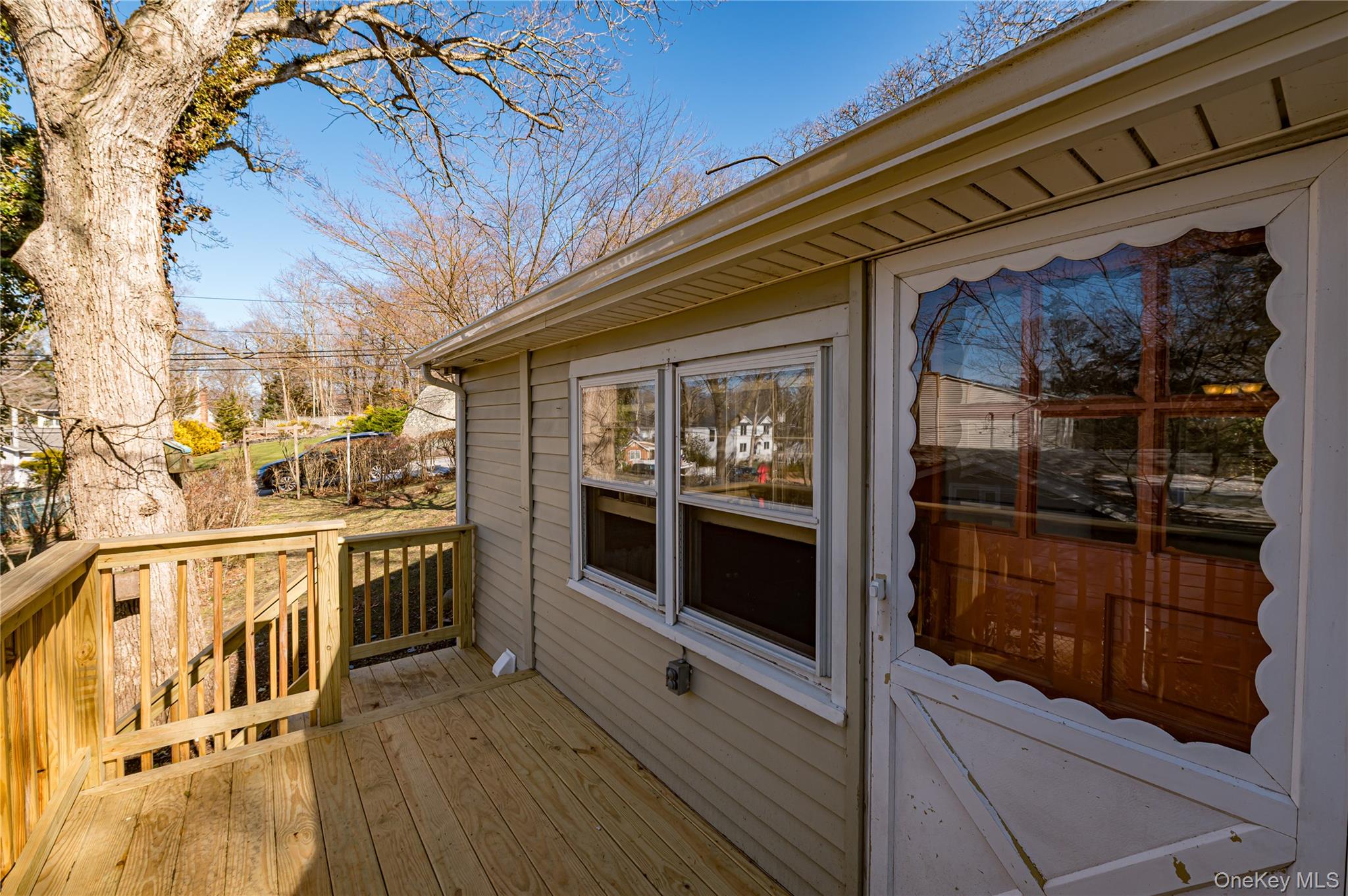 75 Herod Point Road Wading River, NY 11792 - Photo 6 of 29 Door into Kitchen from Deck