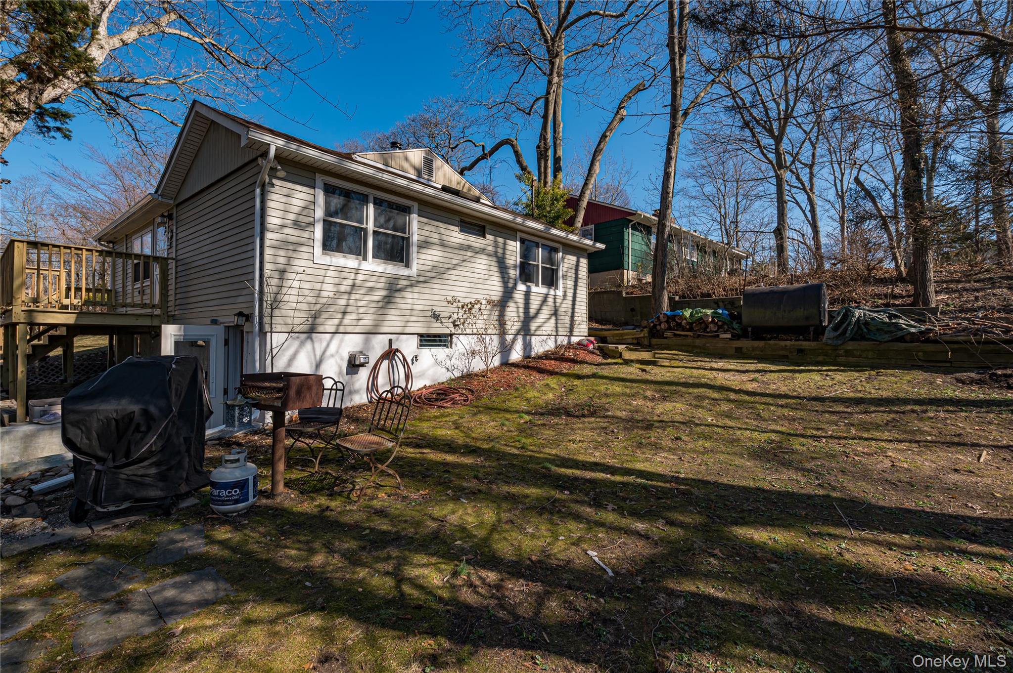 75 Herod Point Road Wading River, NY 11792 - Photo 9 of 29 Partially fenced backyard