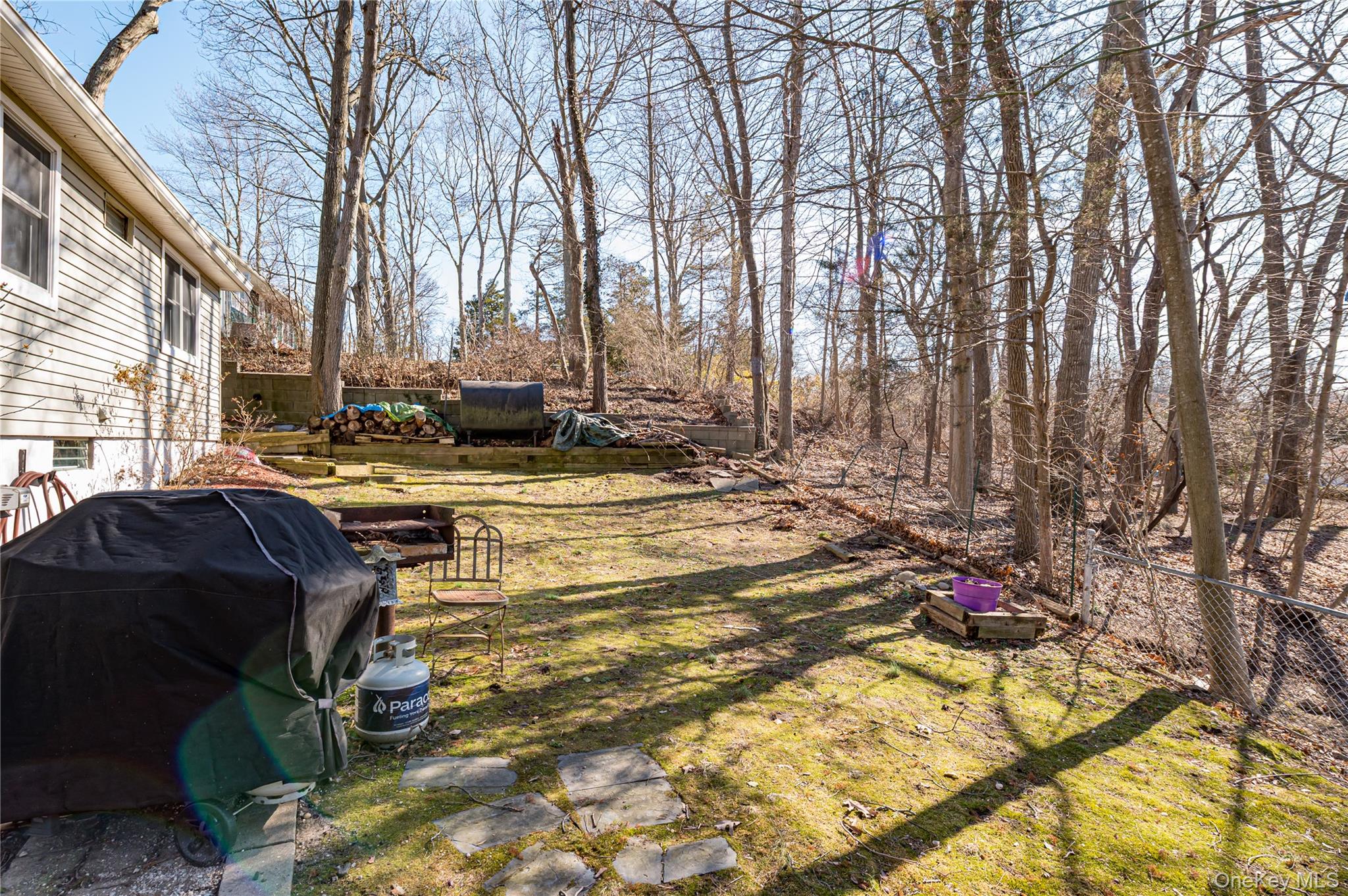 75 Herod Point Road Wading River, NY 11792 - Photo 10 of 29 Alternate view of backyard, exterior oil tank