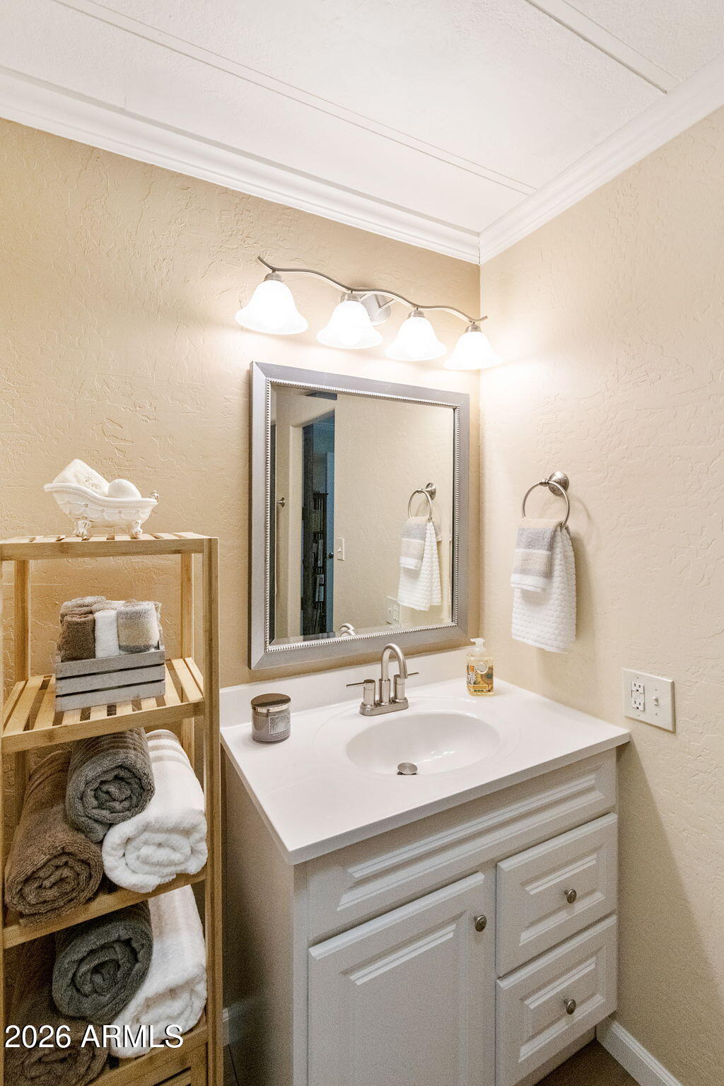 2435 North Higley Road Mesa, AZ 85215 - Photo 20 of 84 a bathroom with a sink and a mirror