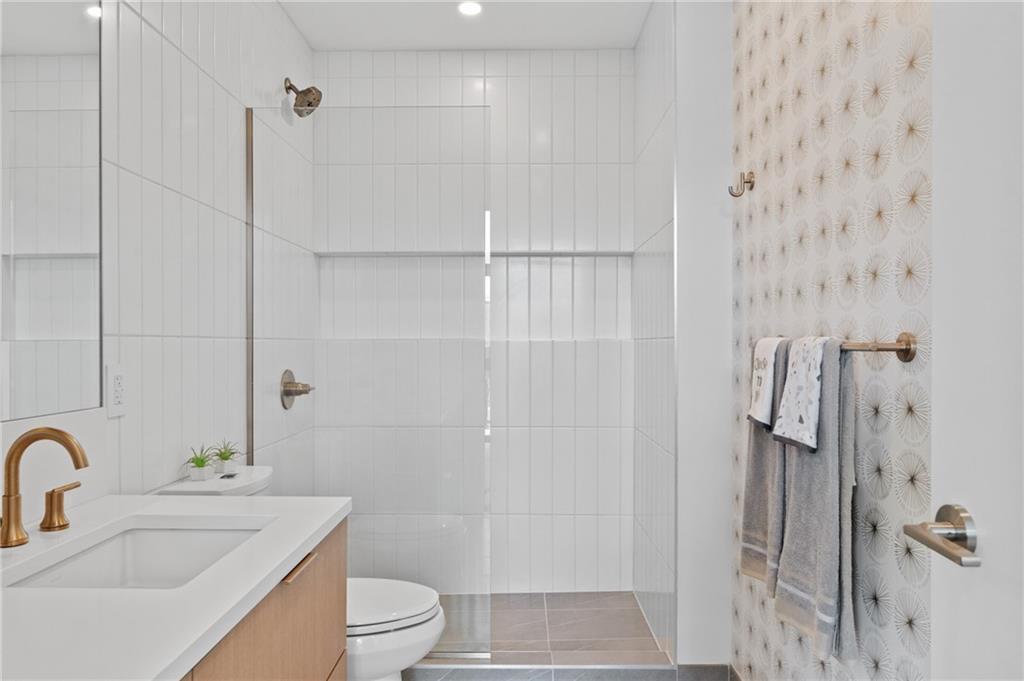 2554 Smallman Street, Unit 504 Pittsburgh, PA 15222 - Photo 14 of 29 a bathroom with a sink toilet and shower
