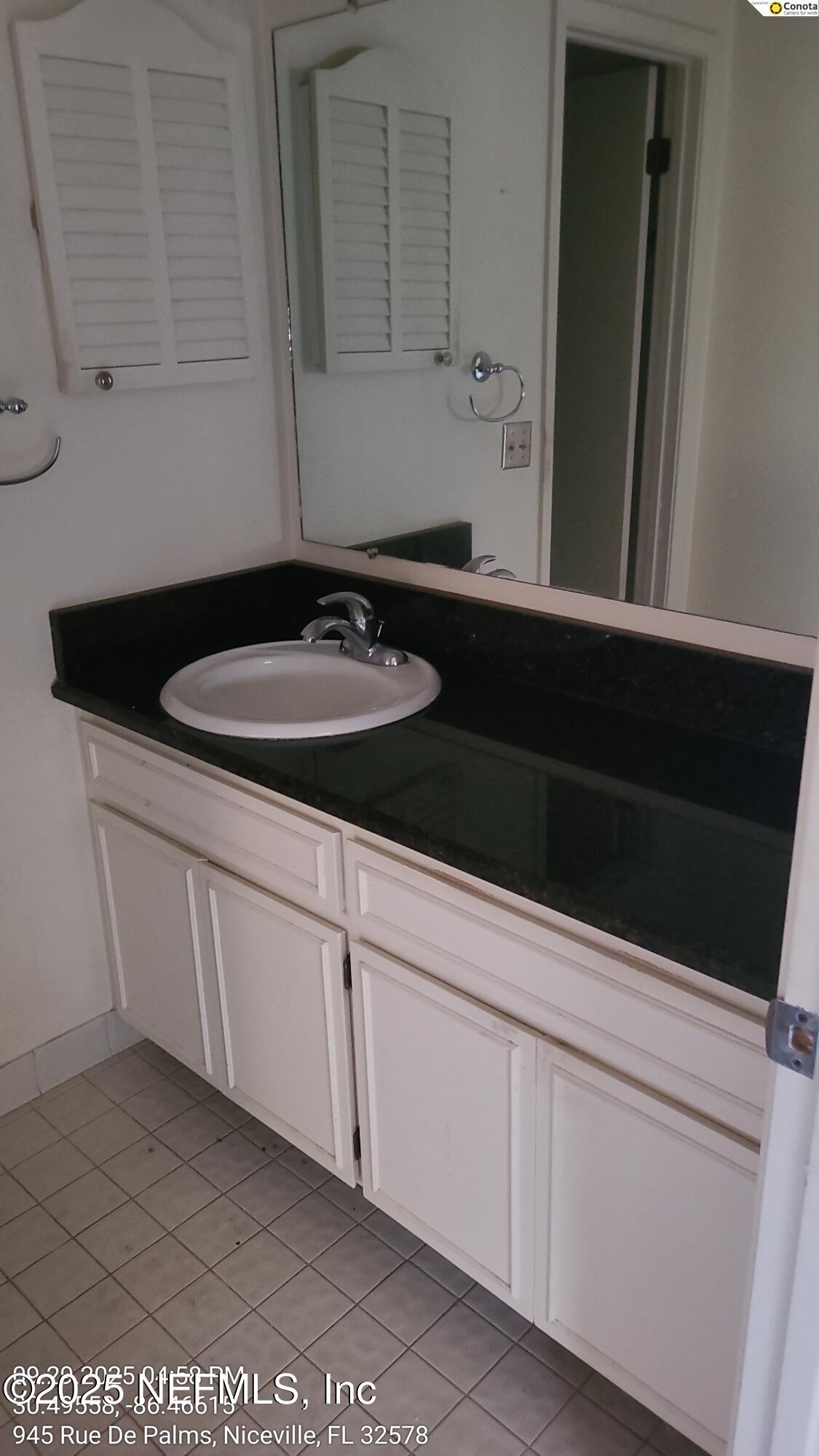 945 Rue De Palms Niceville, FL 32578 - Photo 11 of 37 a close view of a sink and dishwasher