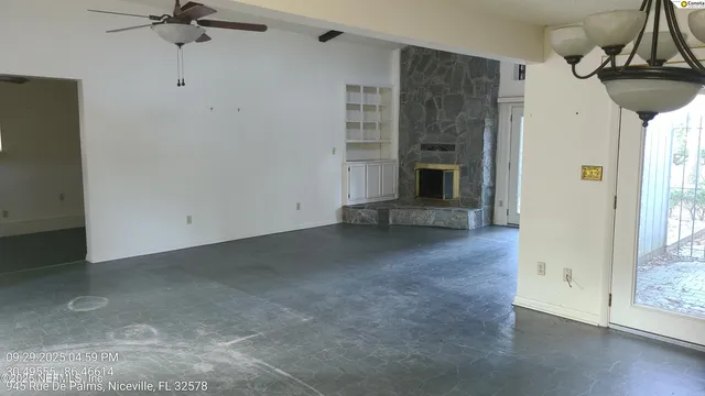 a view of a livingroom with a fireplace