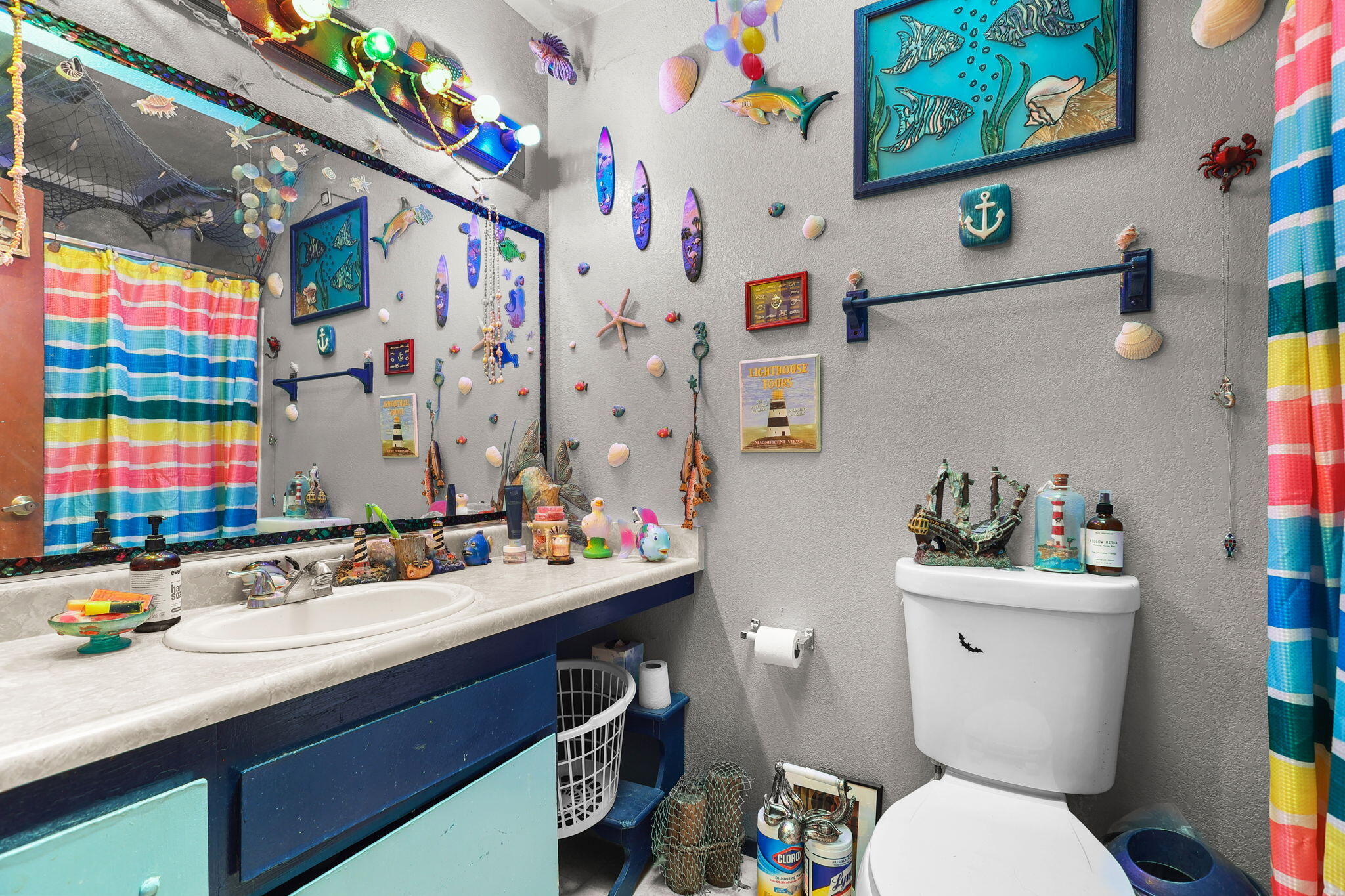 2760 Oriole Drive Red Bluff, CA 96080 - Photo 11 of 25 a bathroom with a sink mirror vanity and toilet