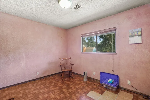 a room with furniture and window