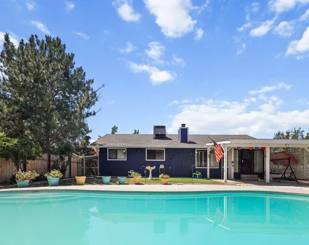 a view of a house with a big yard